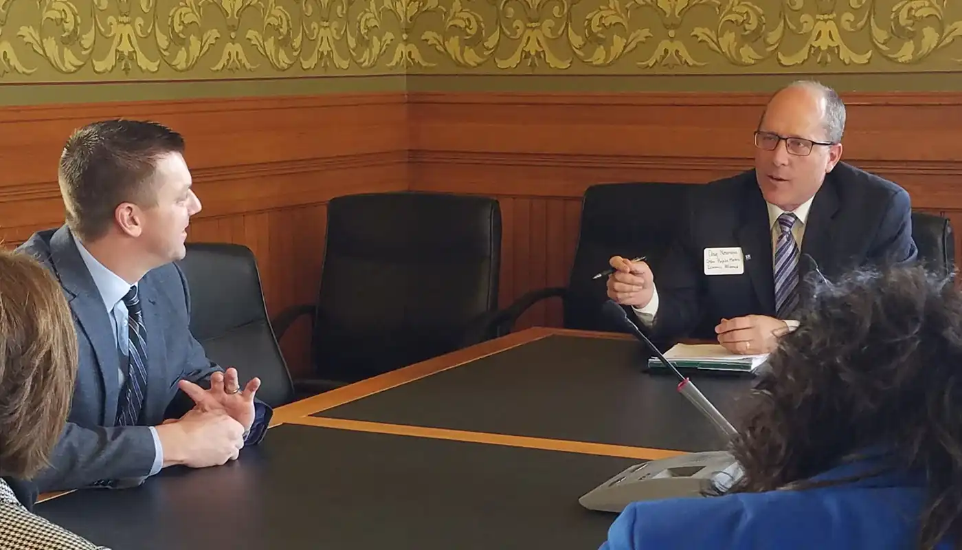 An elected officials office with people at a desk