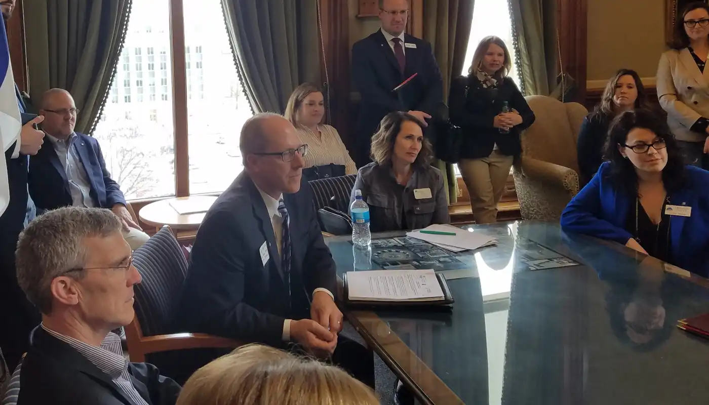 An elected officials office with people at a desk