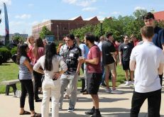 Group of people talking to each other