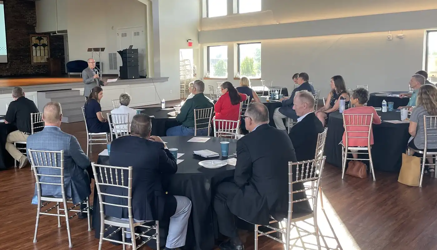 Business people gather for a working breakfast