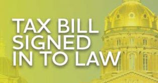 Image with text Tax Bill Signed in To Law