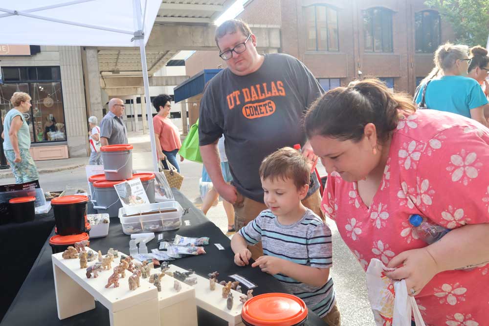 family in farmers market