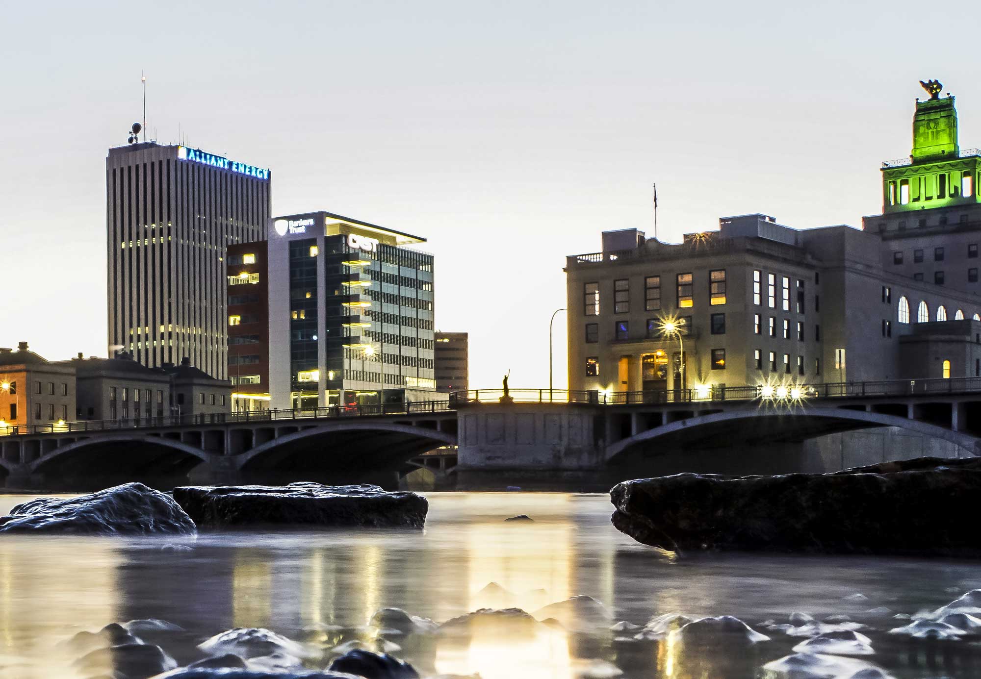 Downtown Cedar Rapids businesses reflected in the Cedar River